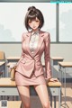 A woman in a pink suit standing in front of a classroom.